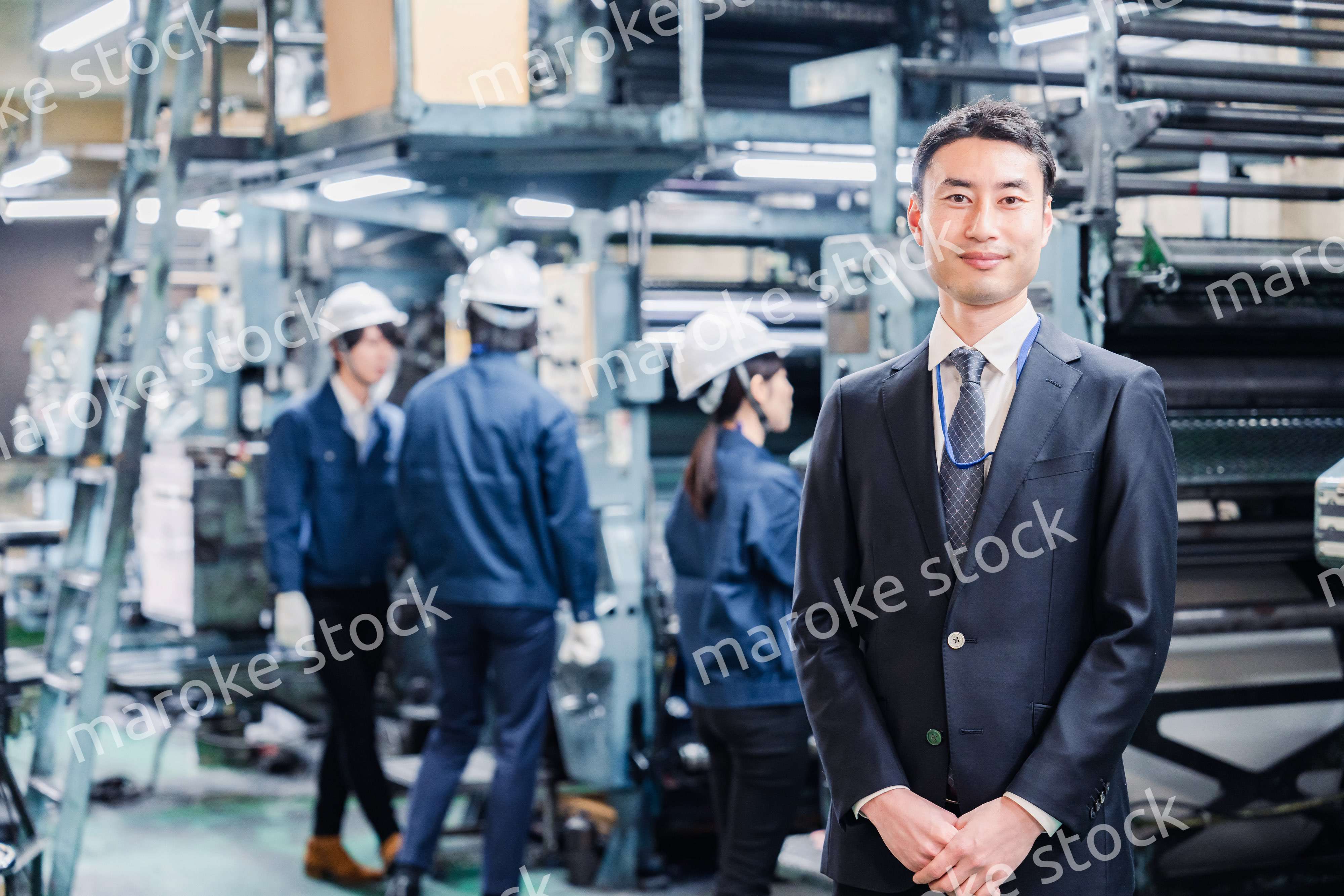 工場を訪問した営業の男性