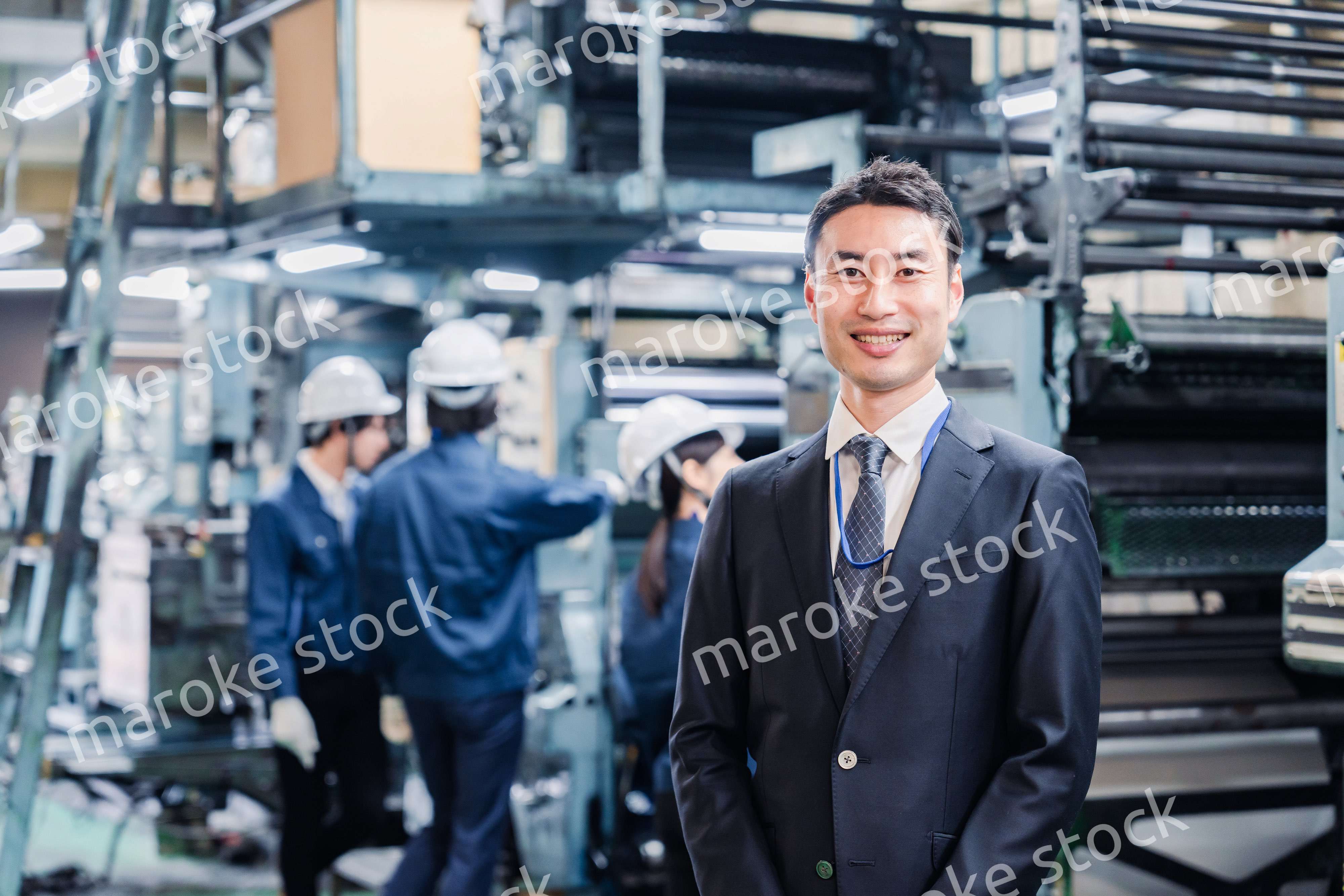 工場を訪問した営業の男性