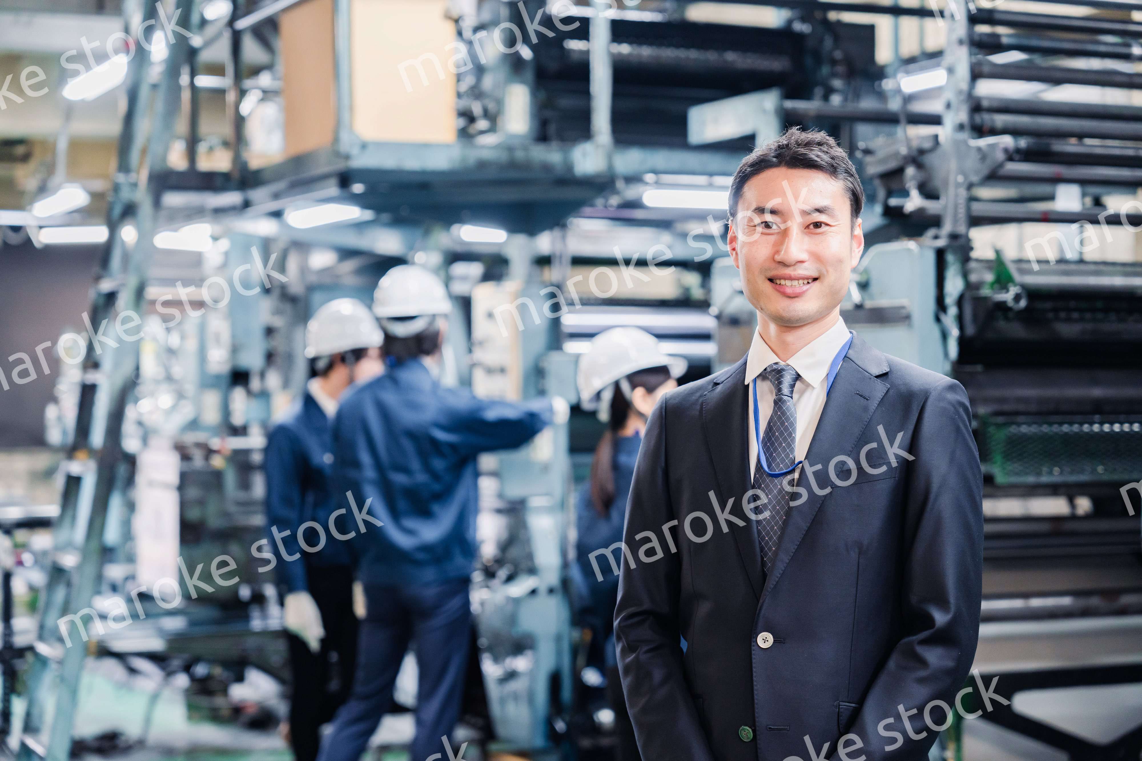 工場を訪問した営業の男性