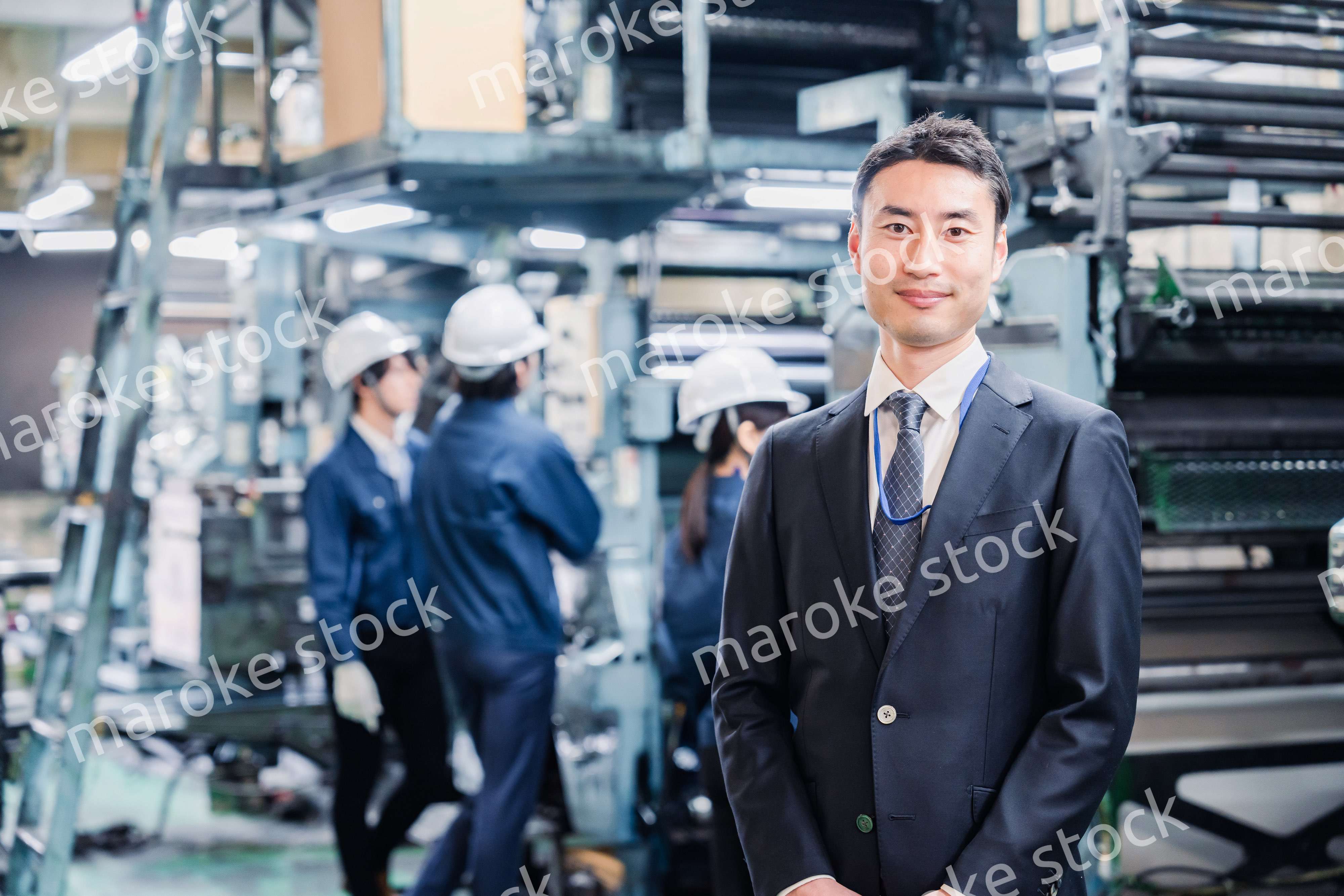 工場を訪問した営業の男性