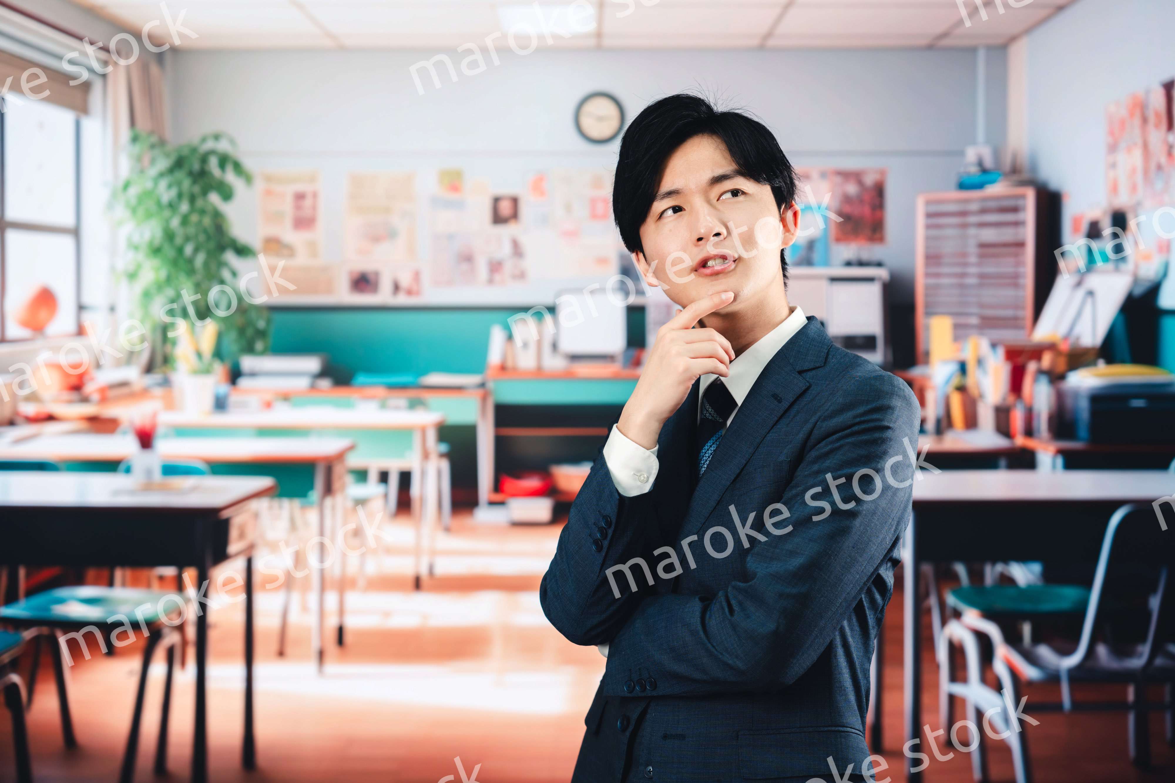 学校で悩む男性教師