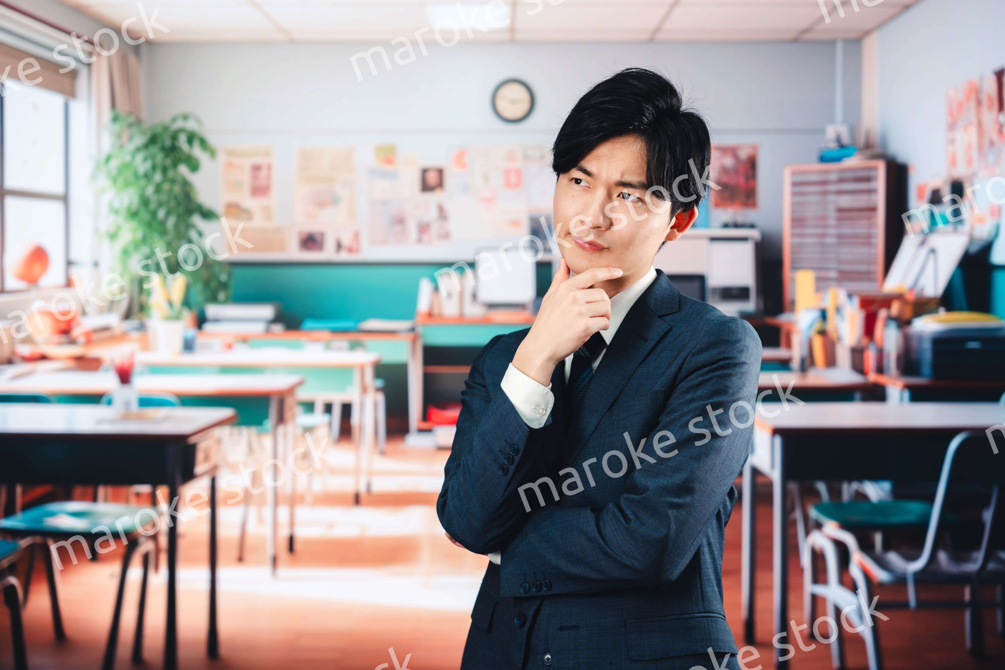 学校で悩む男性教師