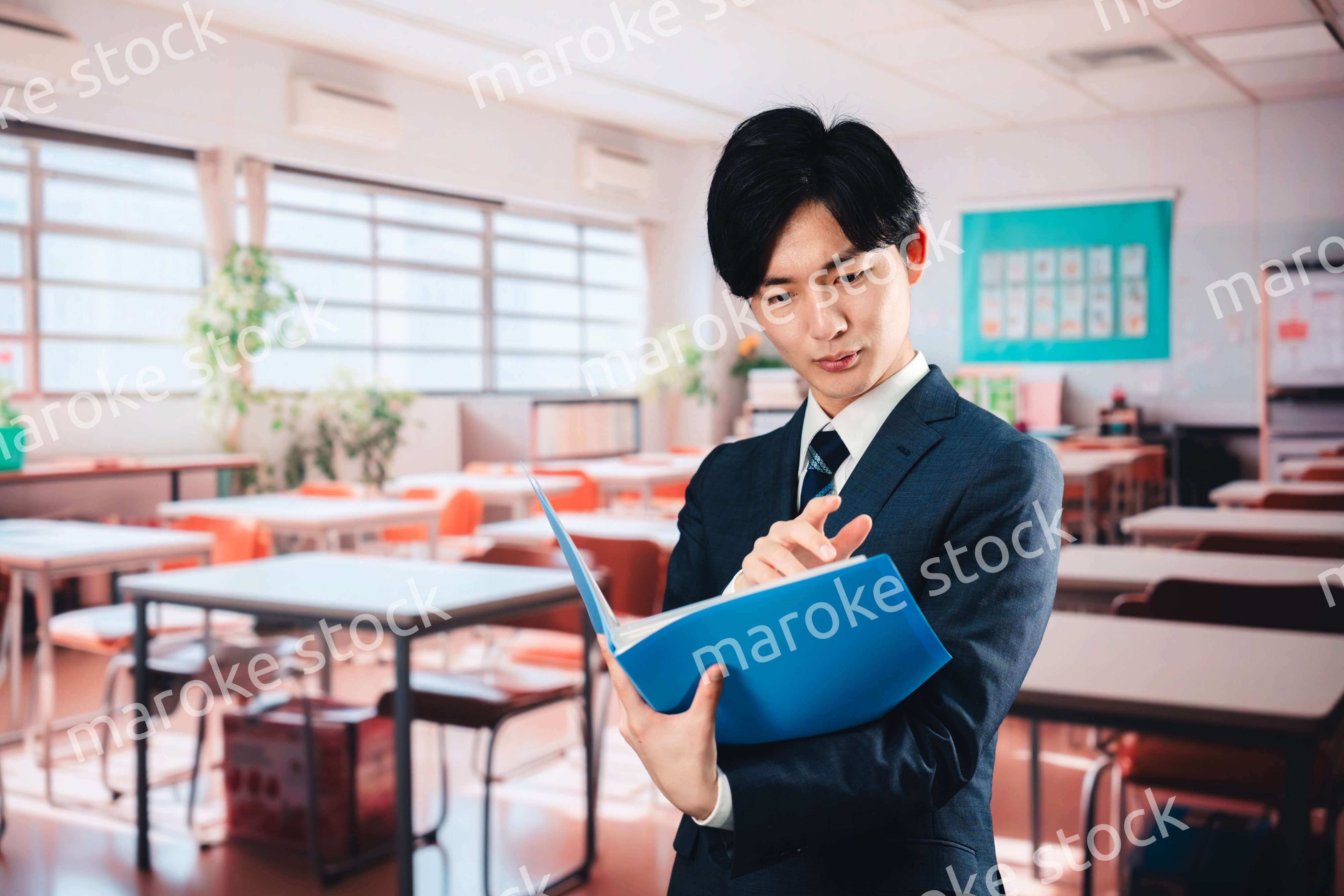 学校で悩む男性教師