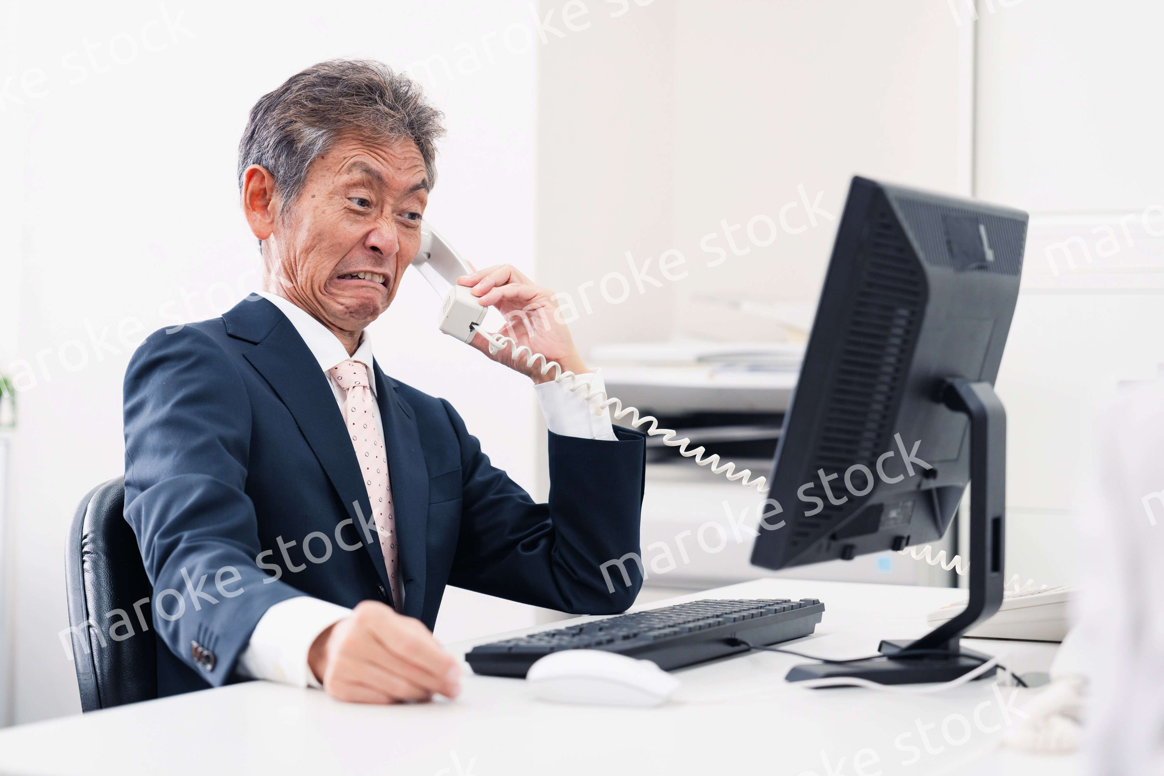 電話で激怒する上司