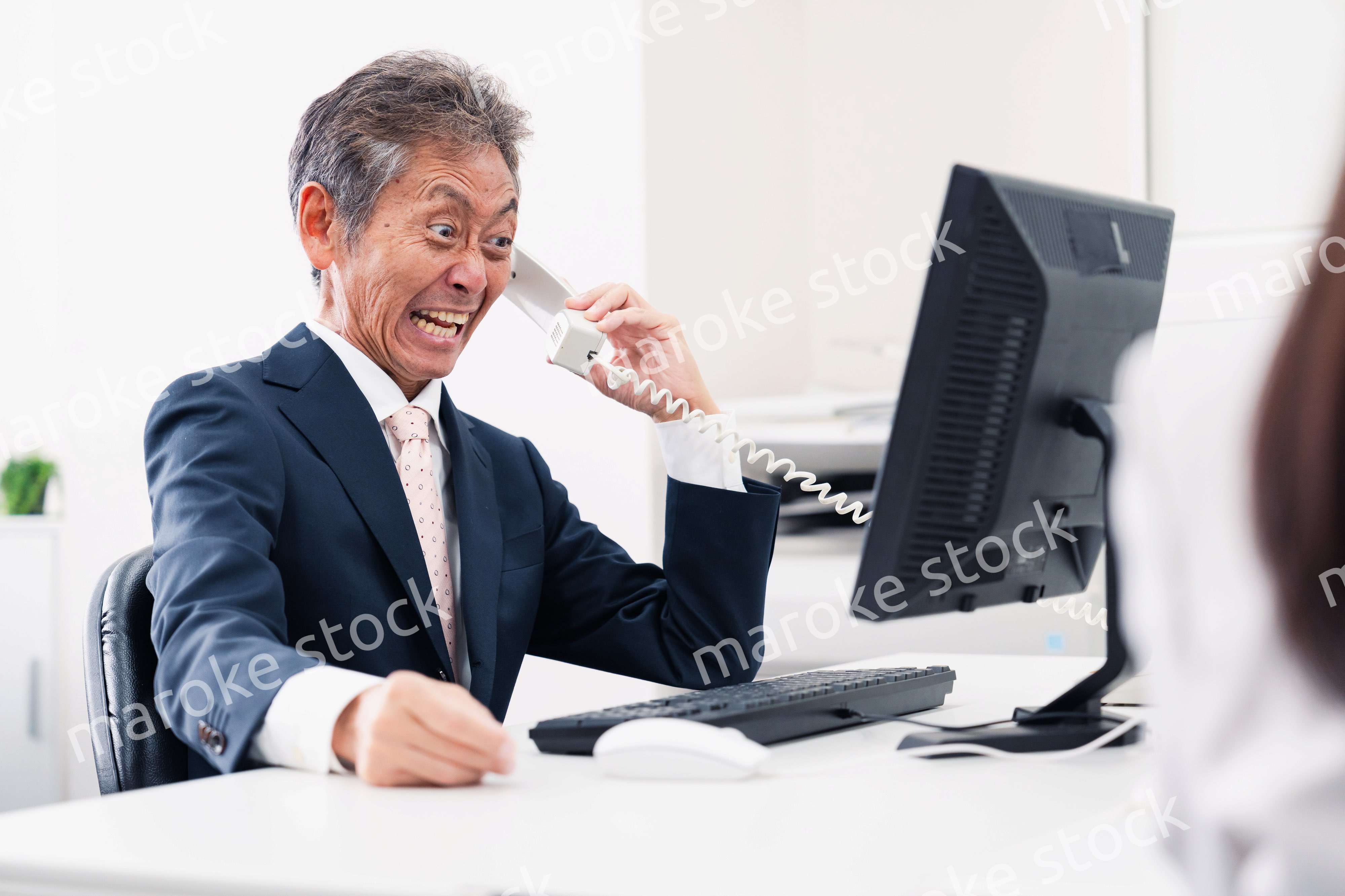 電話で激怒する上司