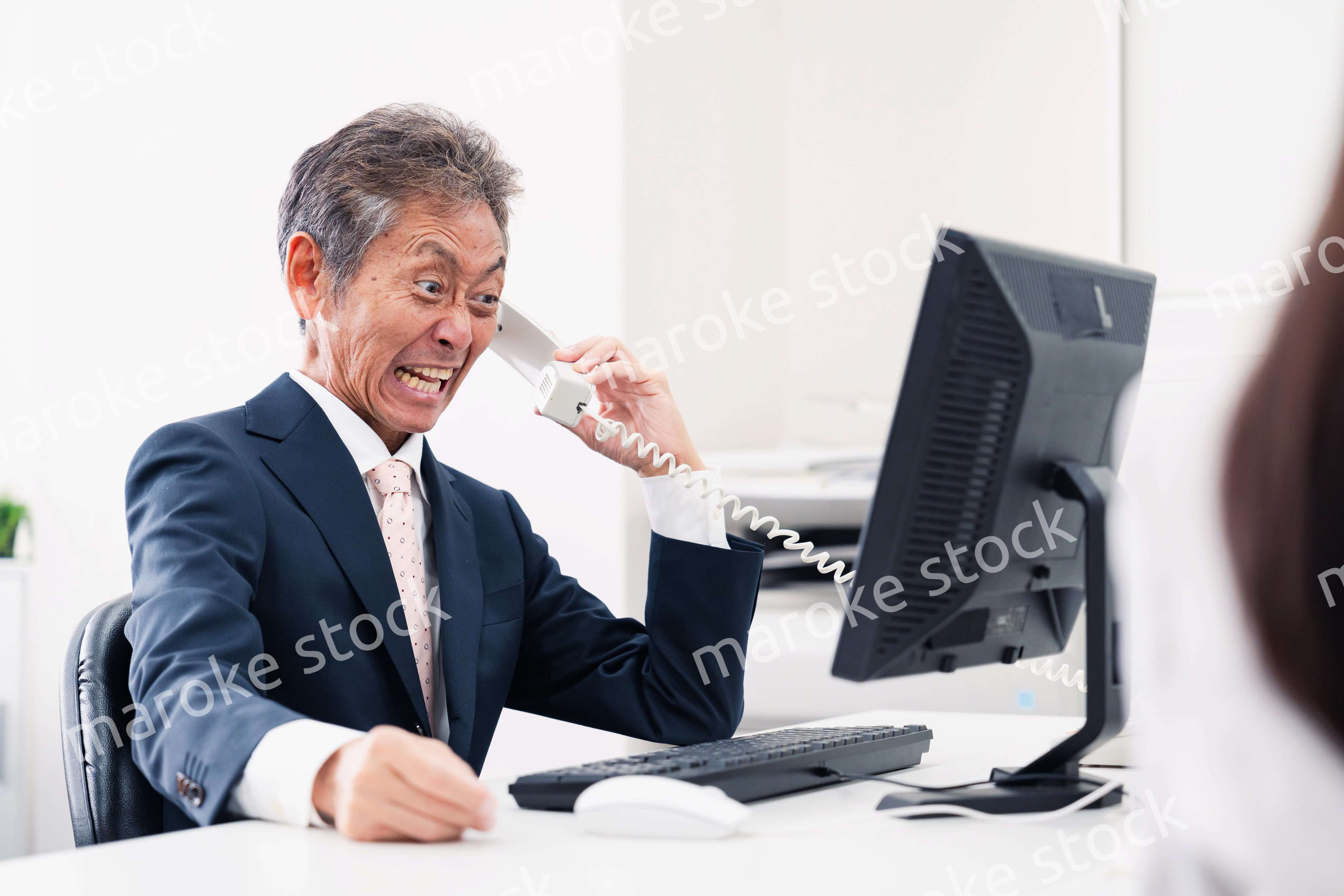 電話で激怒する上司