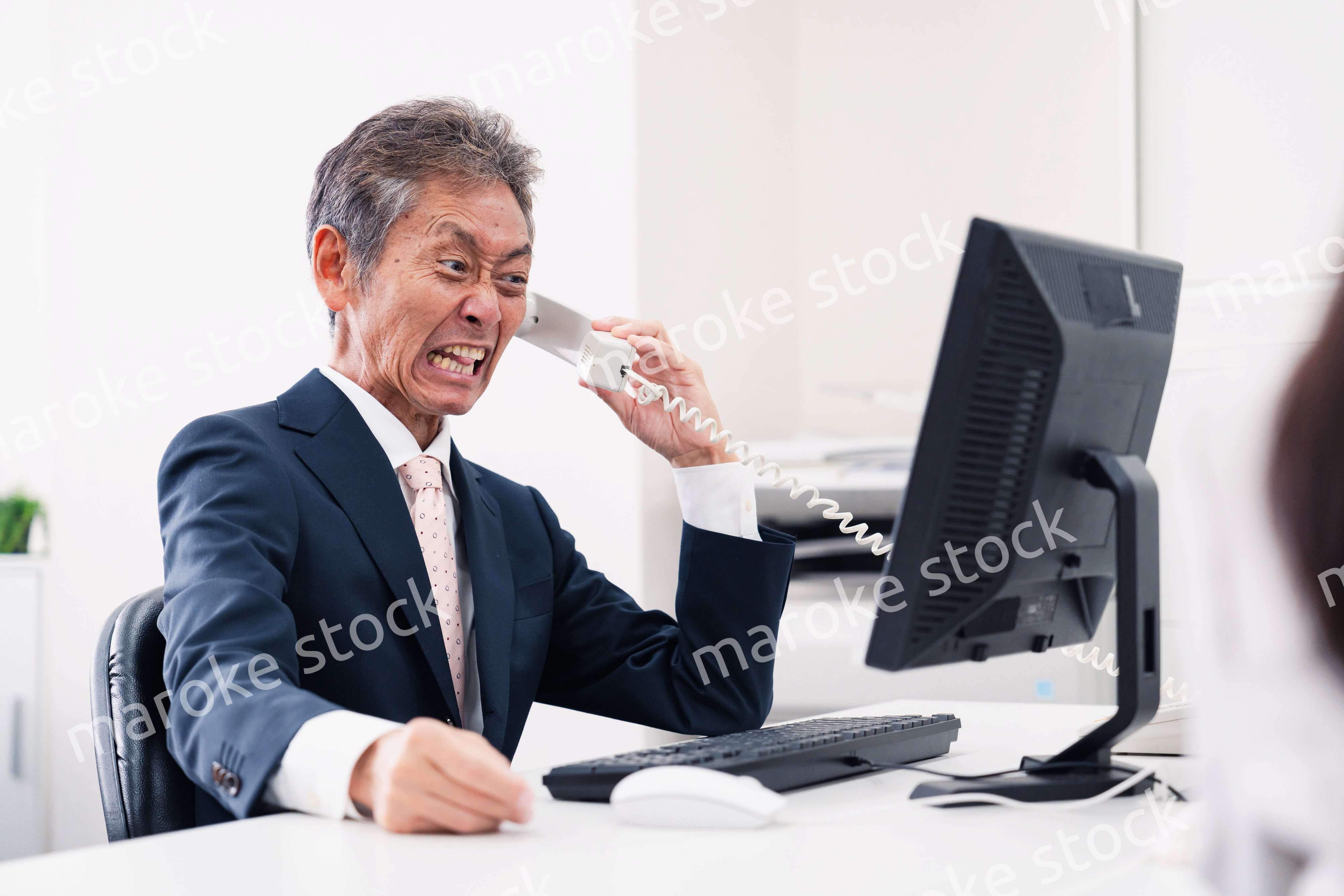 電話で激怒する上司
