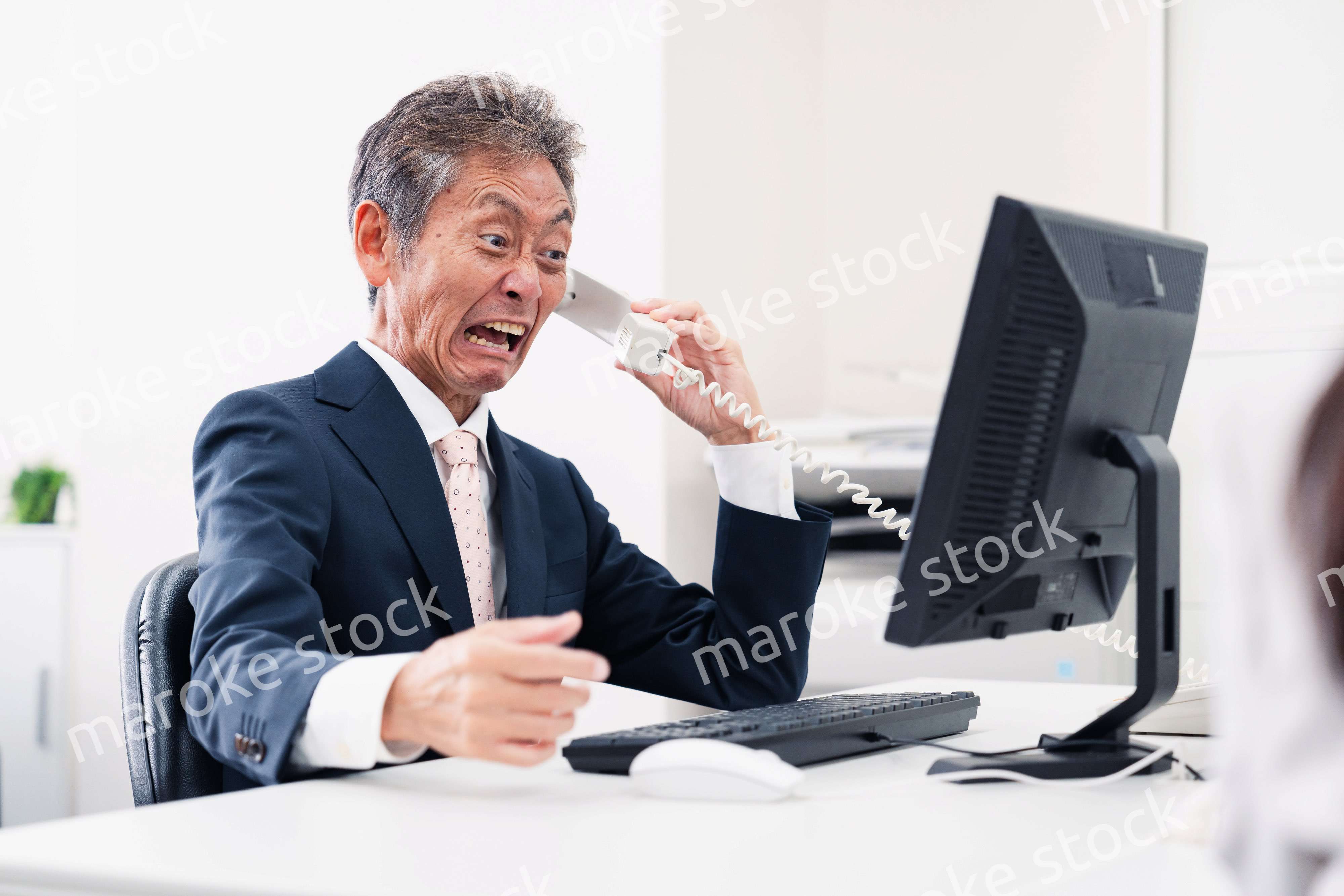 電話で激怒する上司
