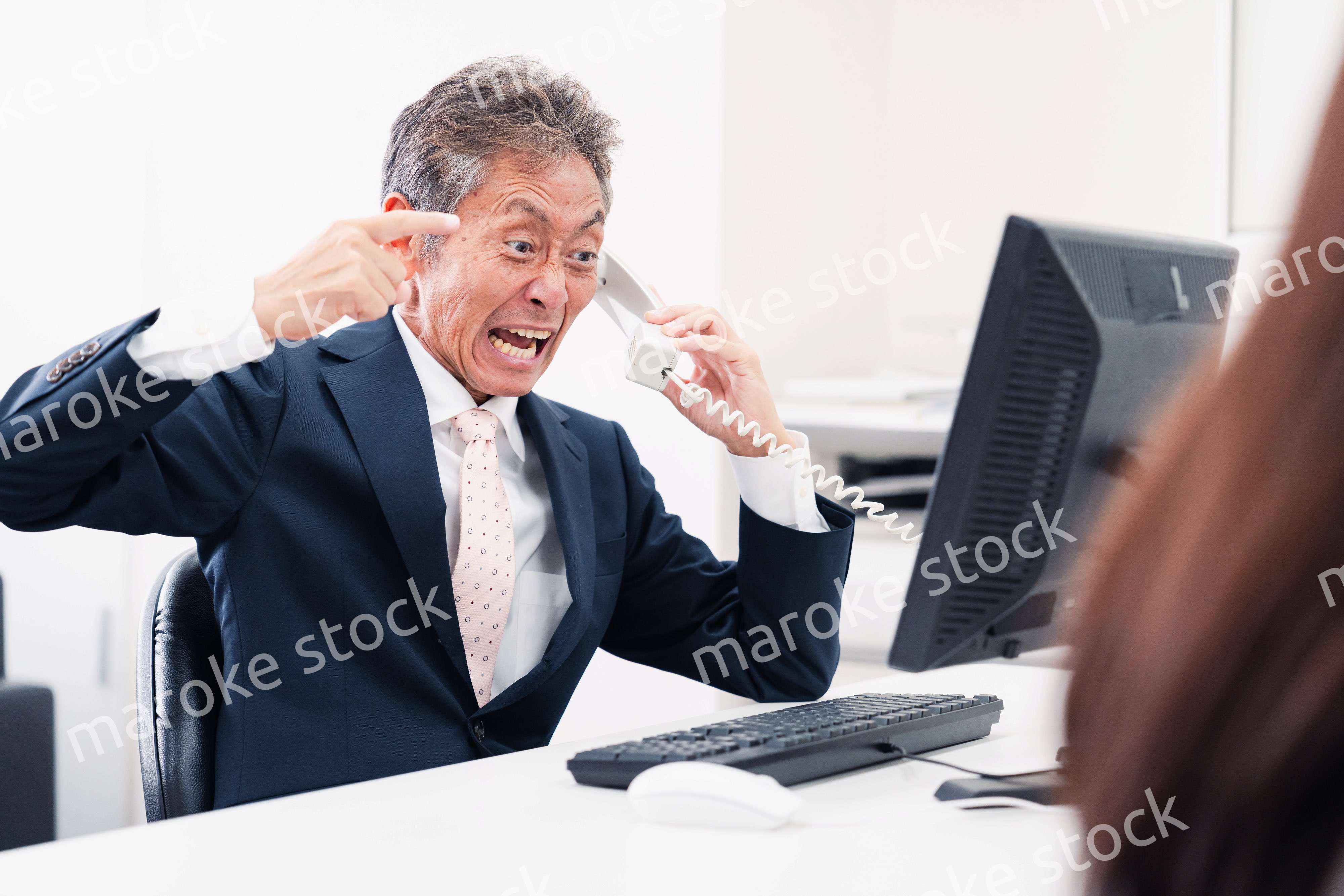 電話で激怒する上司