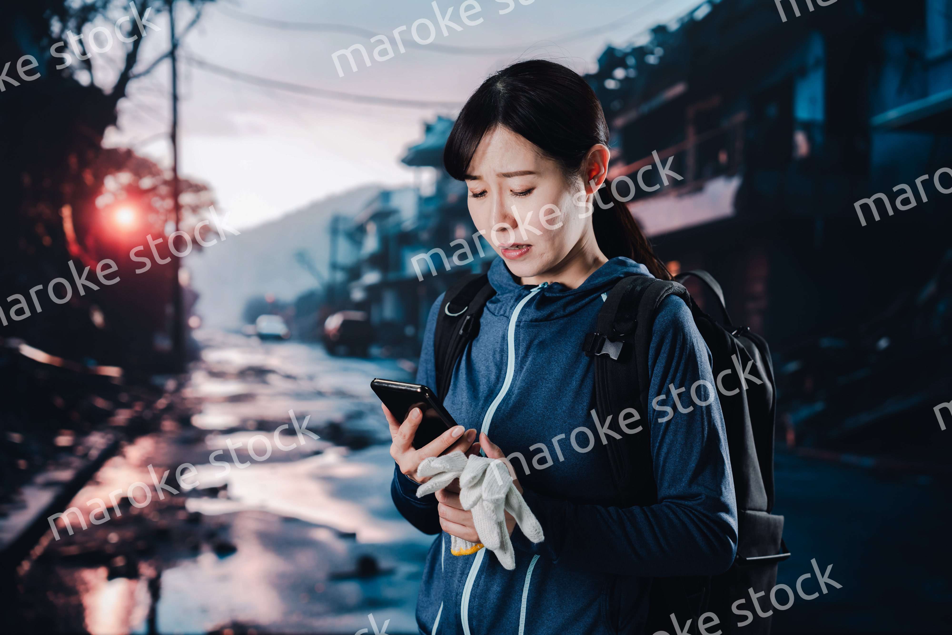 災害に遭い途方に暮れる女性