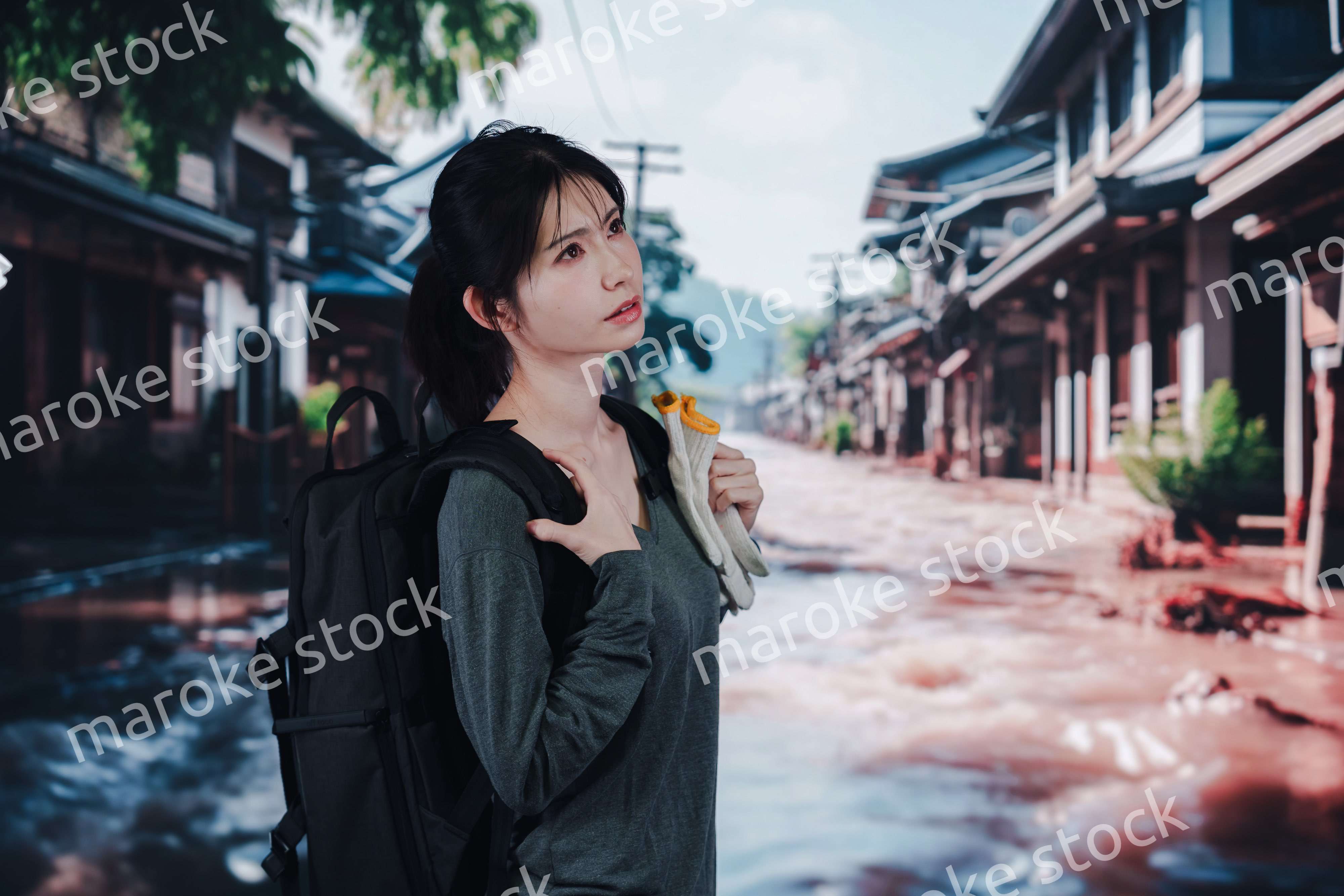 災害で被災した若い女性