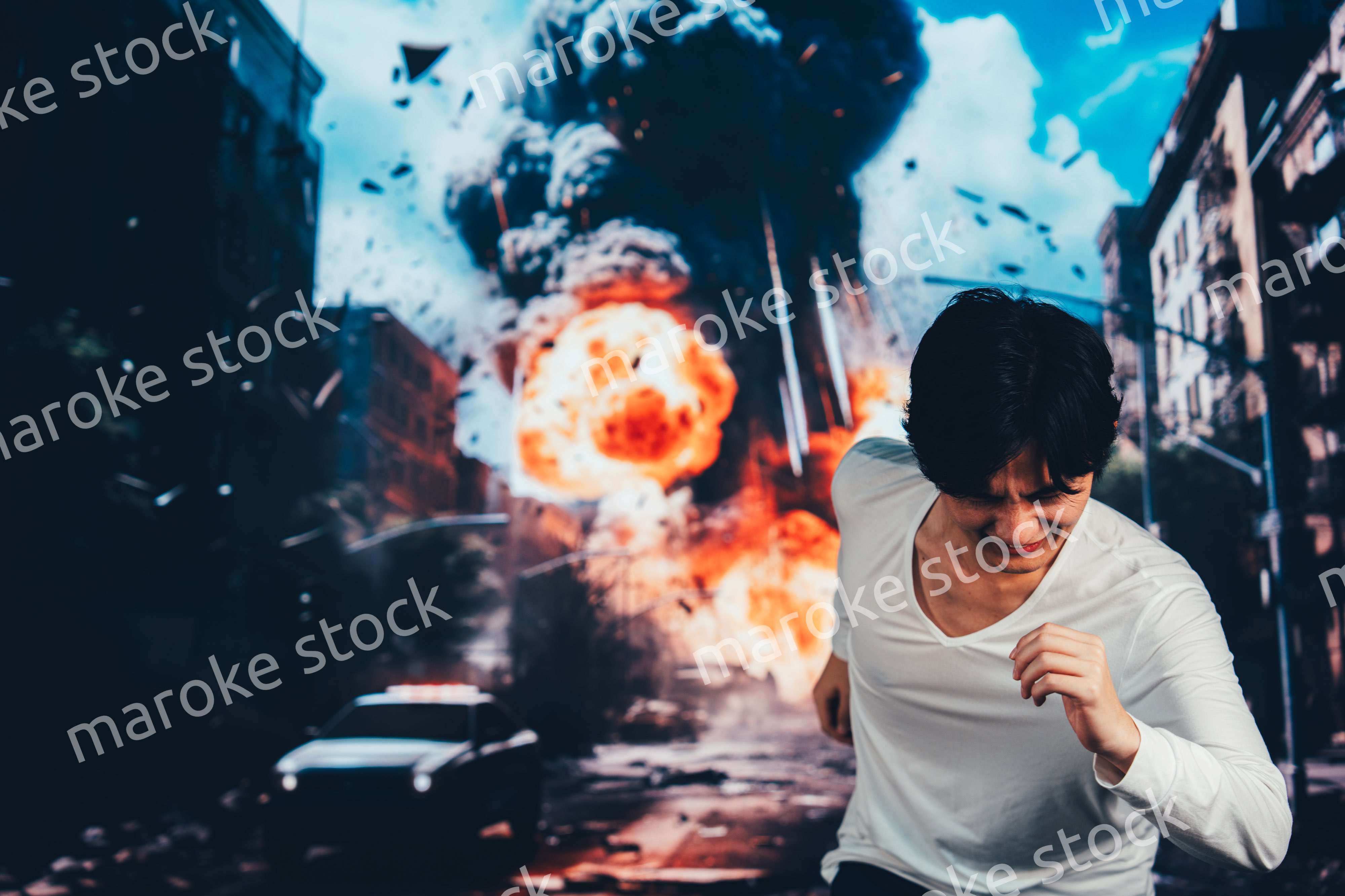 爆弾が落ちてきて避難する男性