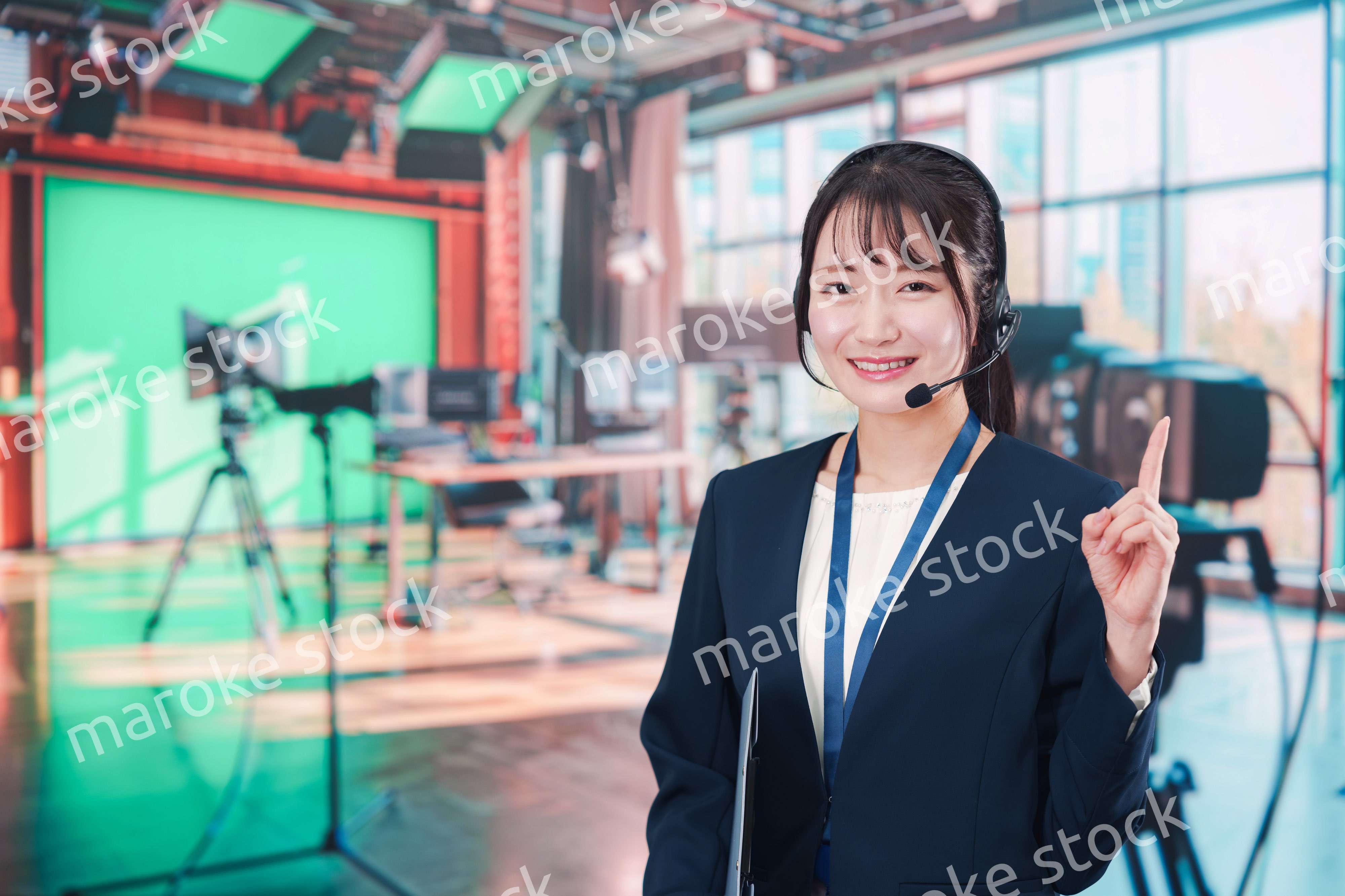 スタジオで働くディレクターの女性