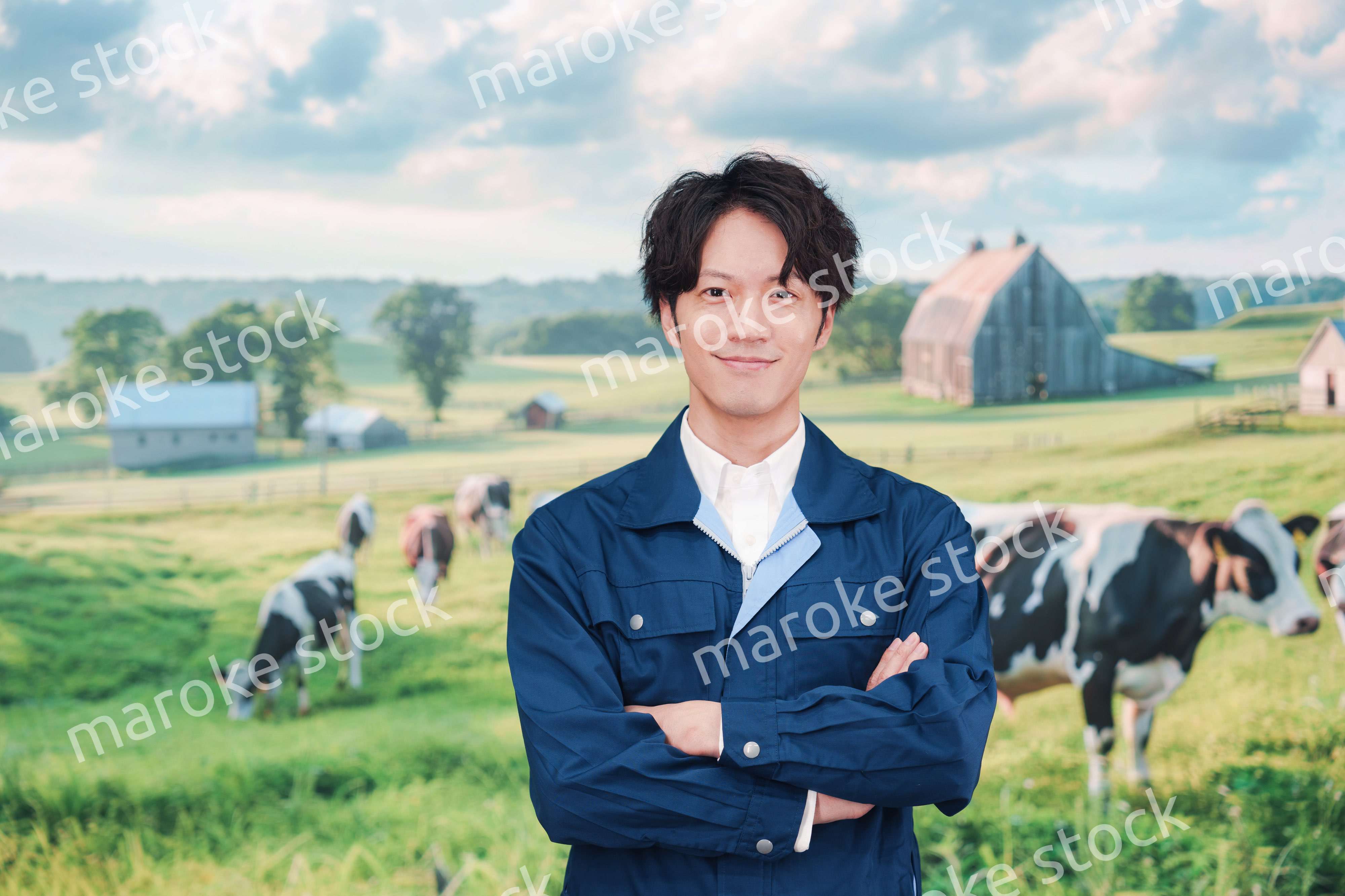 牧場で働く若い男性