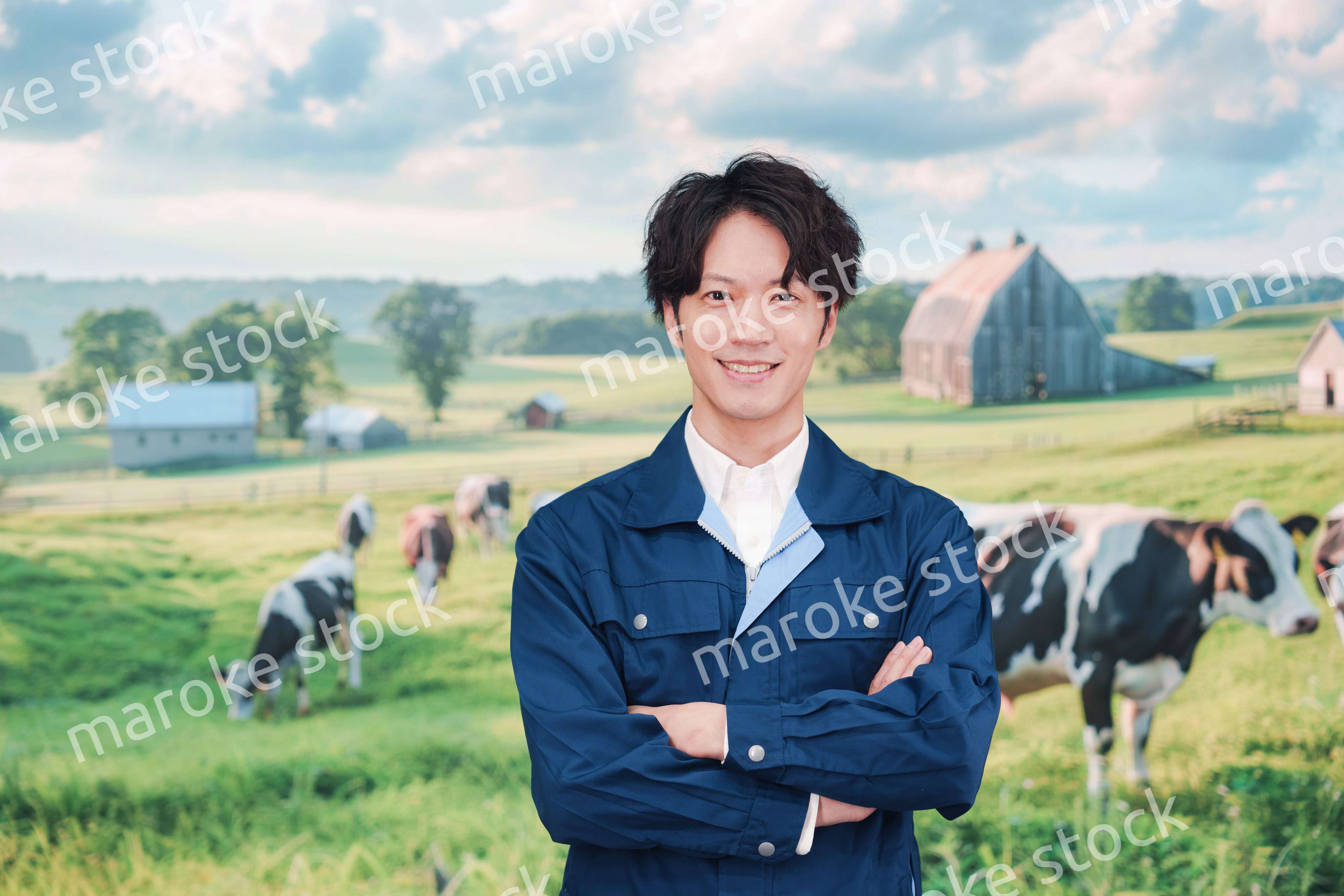 牧場で働く若い男性