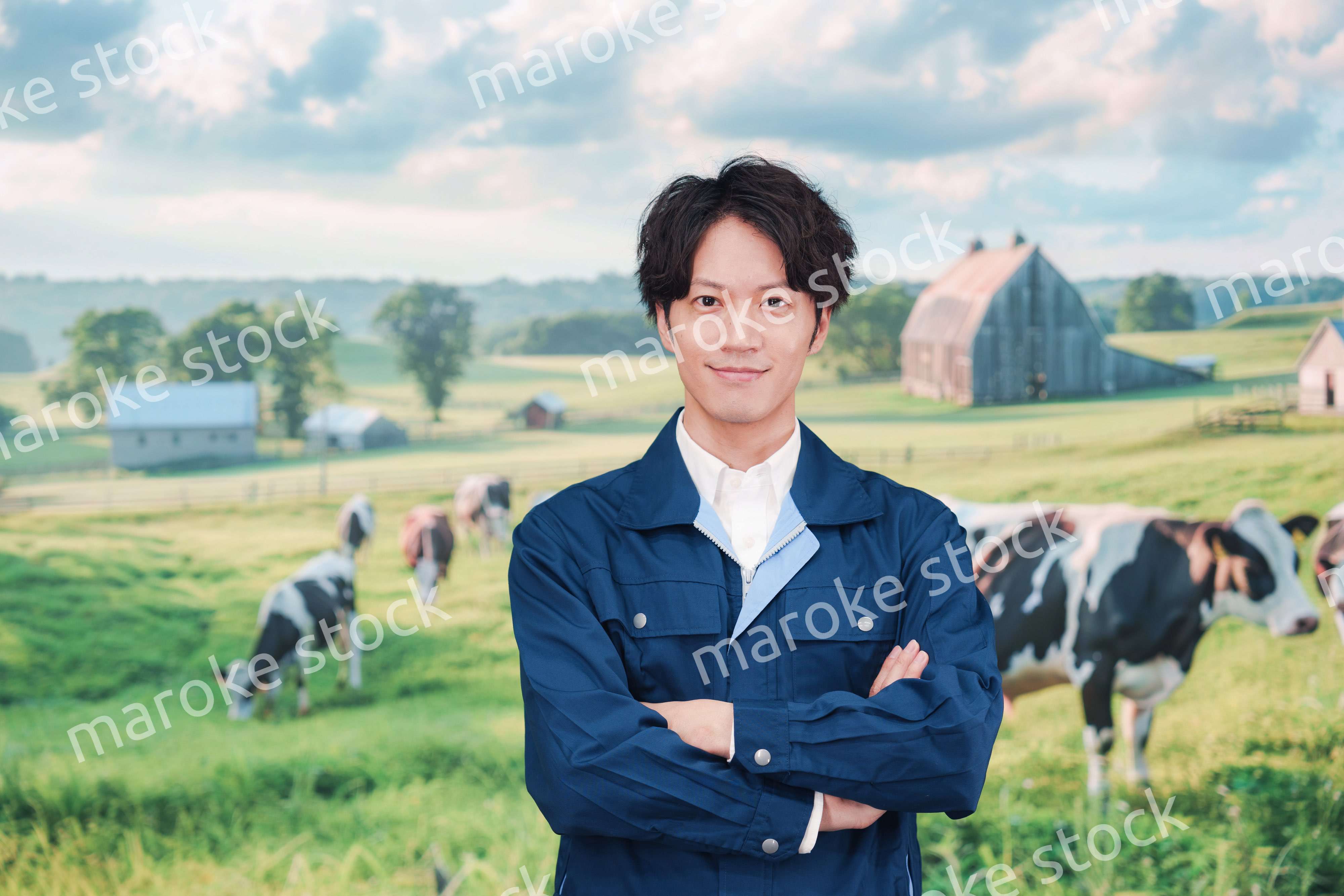 牧場で働く若い男性