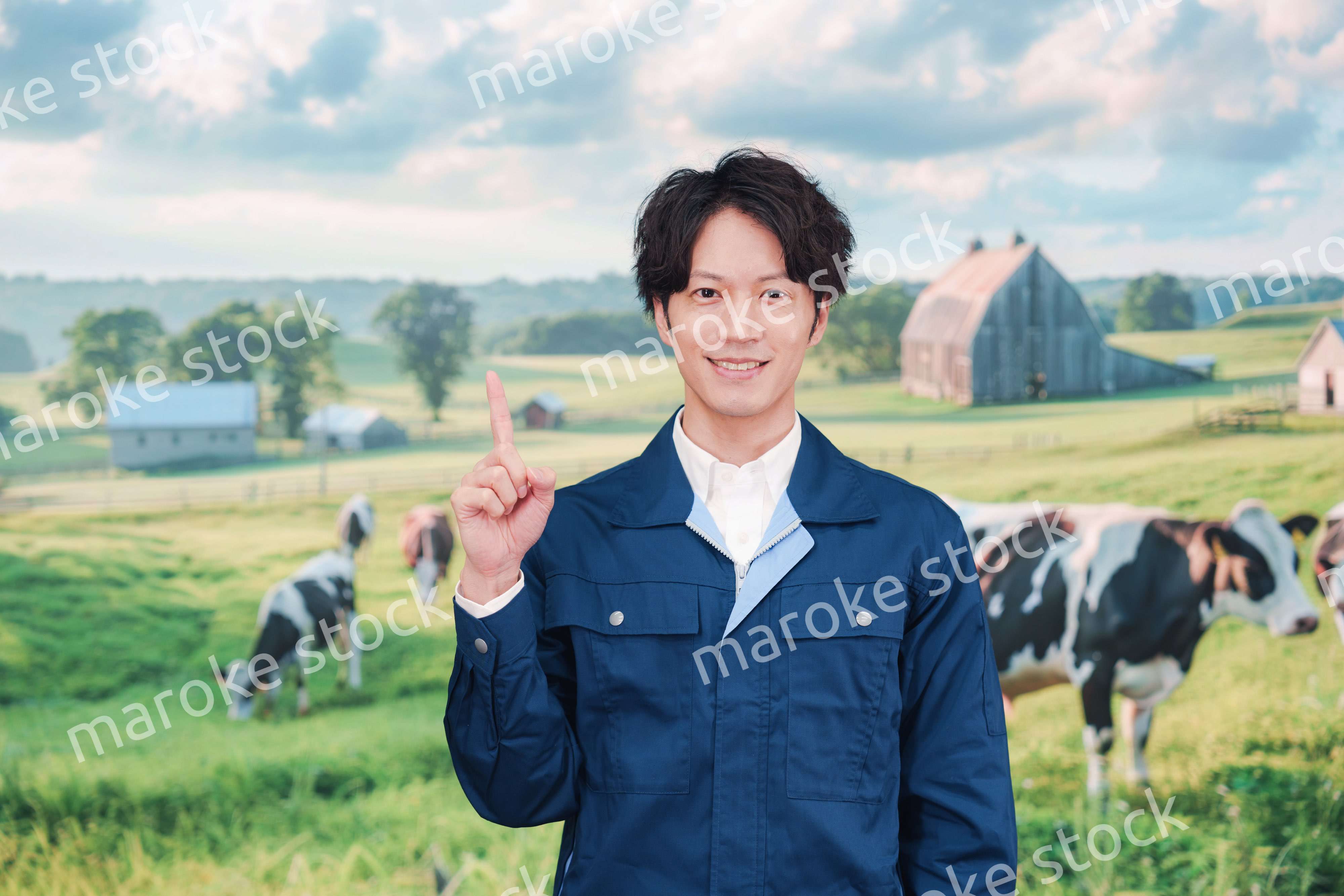 牧場で働く若い男性