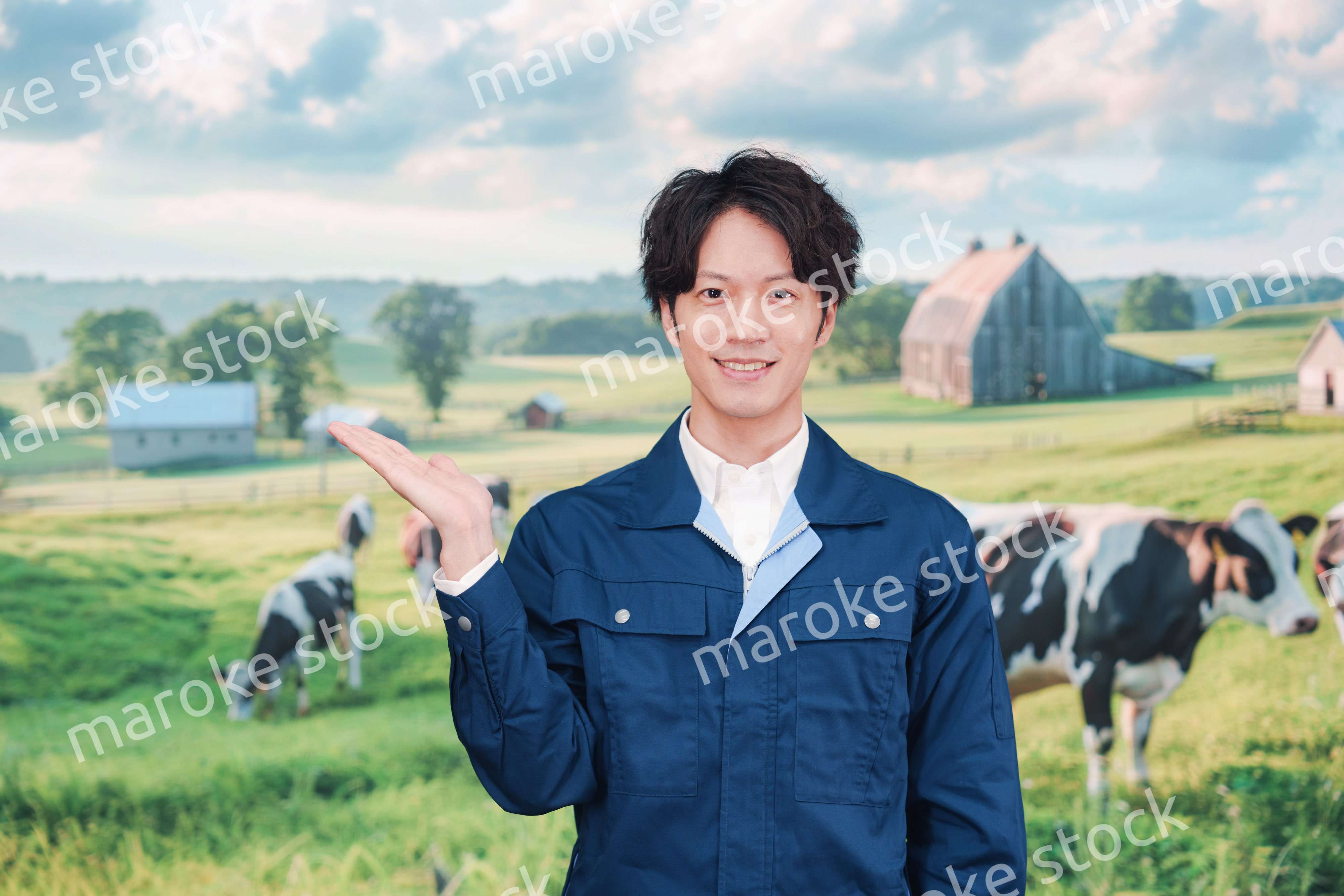 牧場で働く若い男性