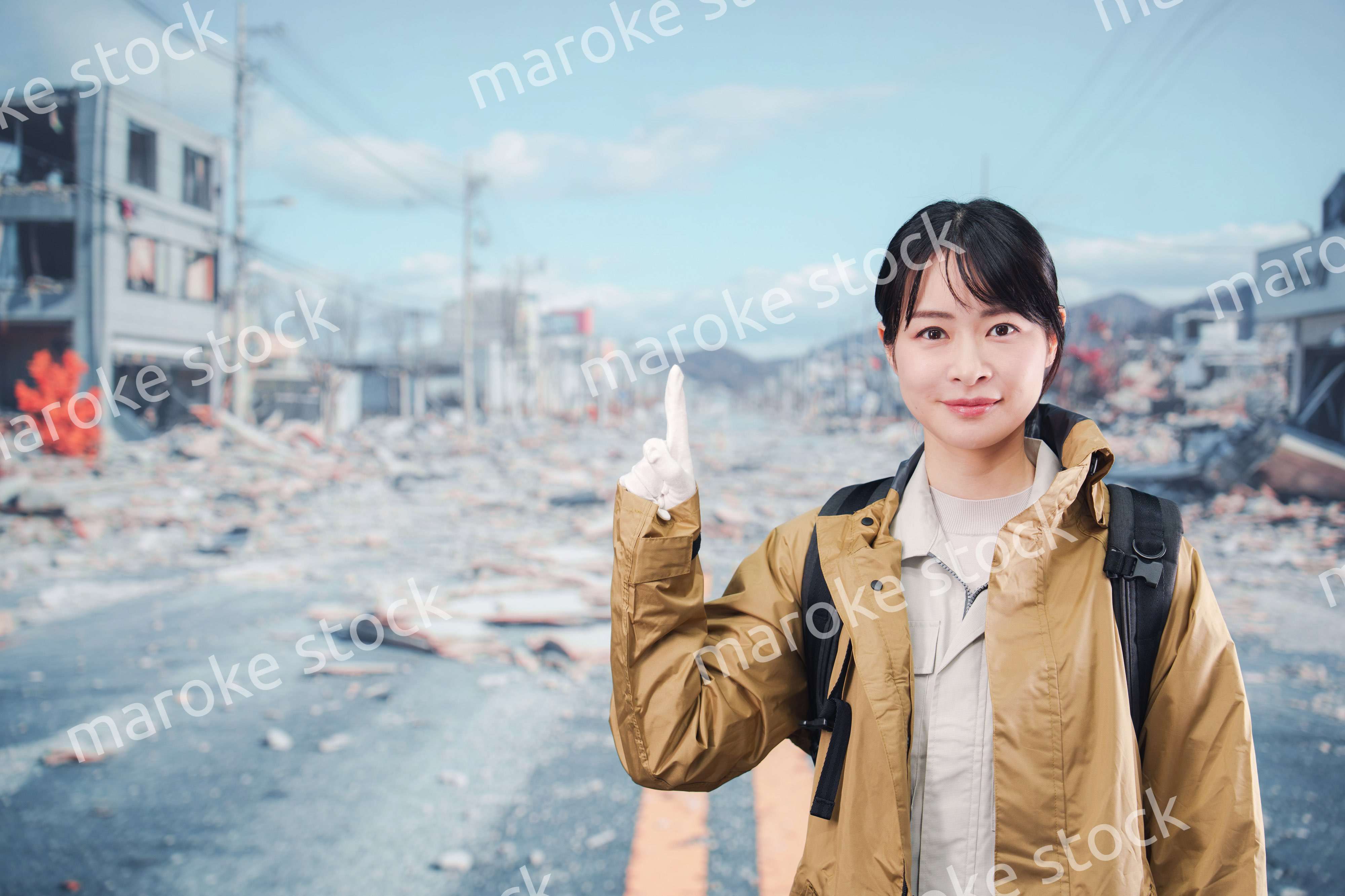 災害で被災し避難をする女性