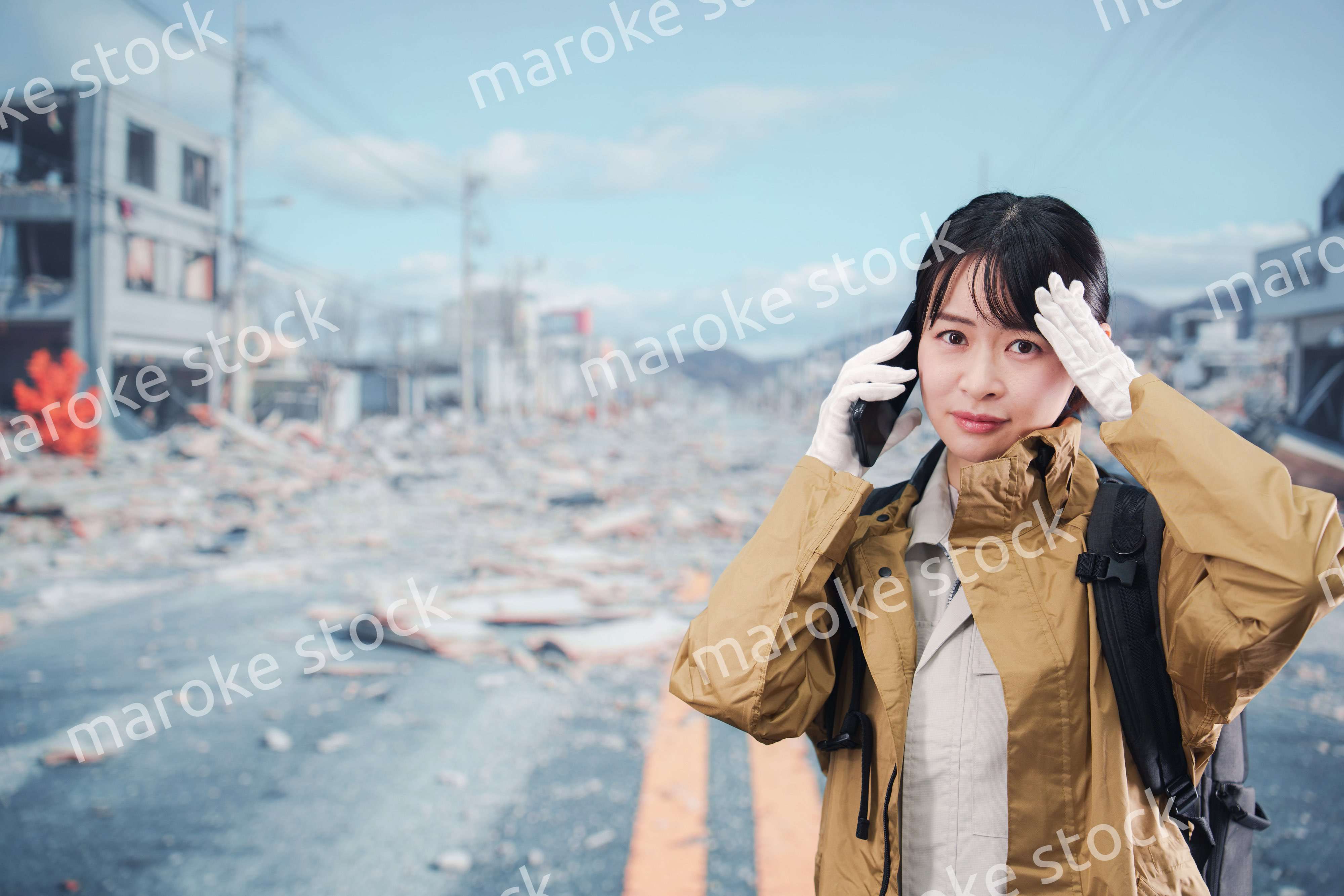 災害で被災し避難をする女性