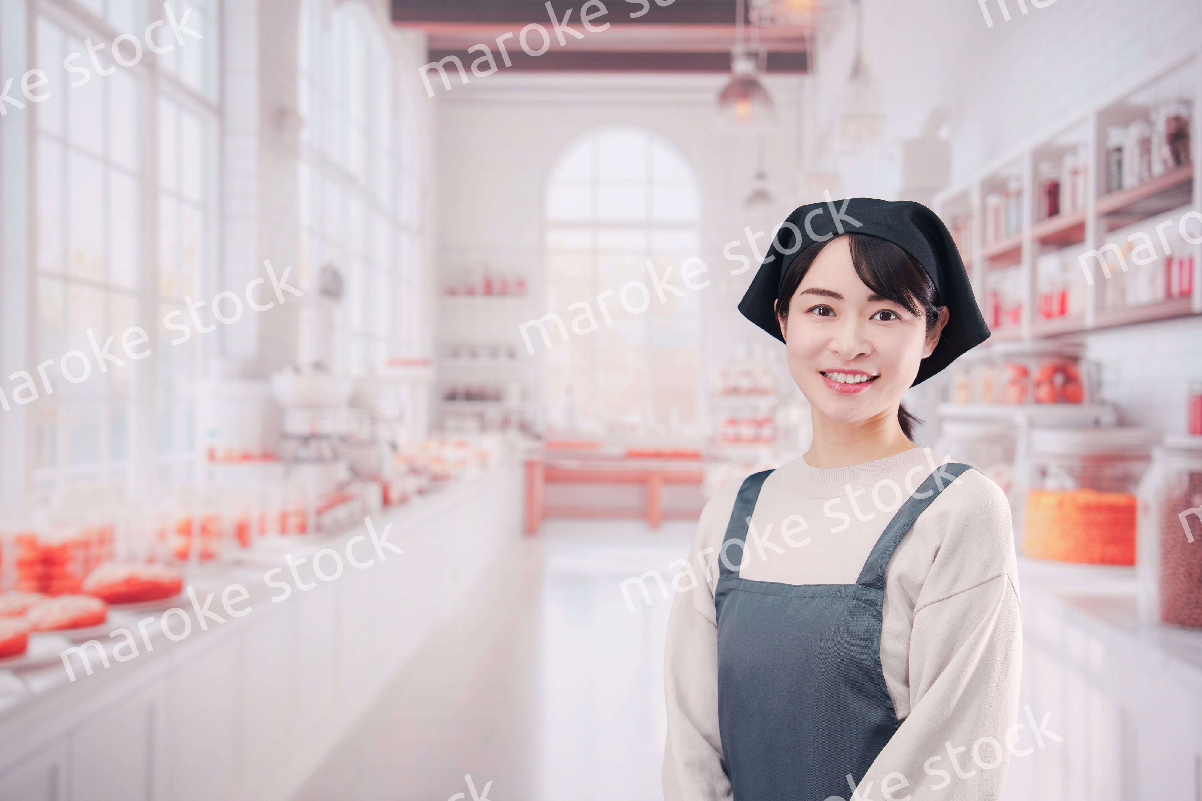 パン屋で働く若い女性