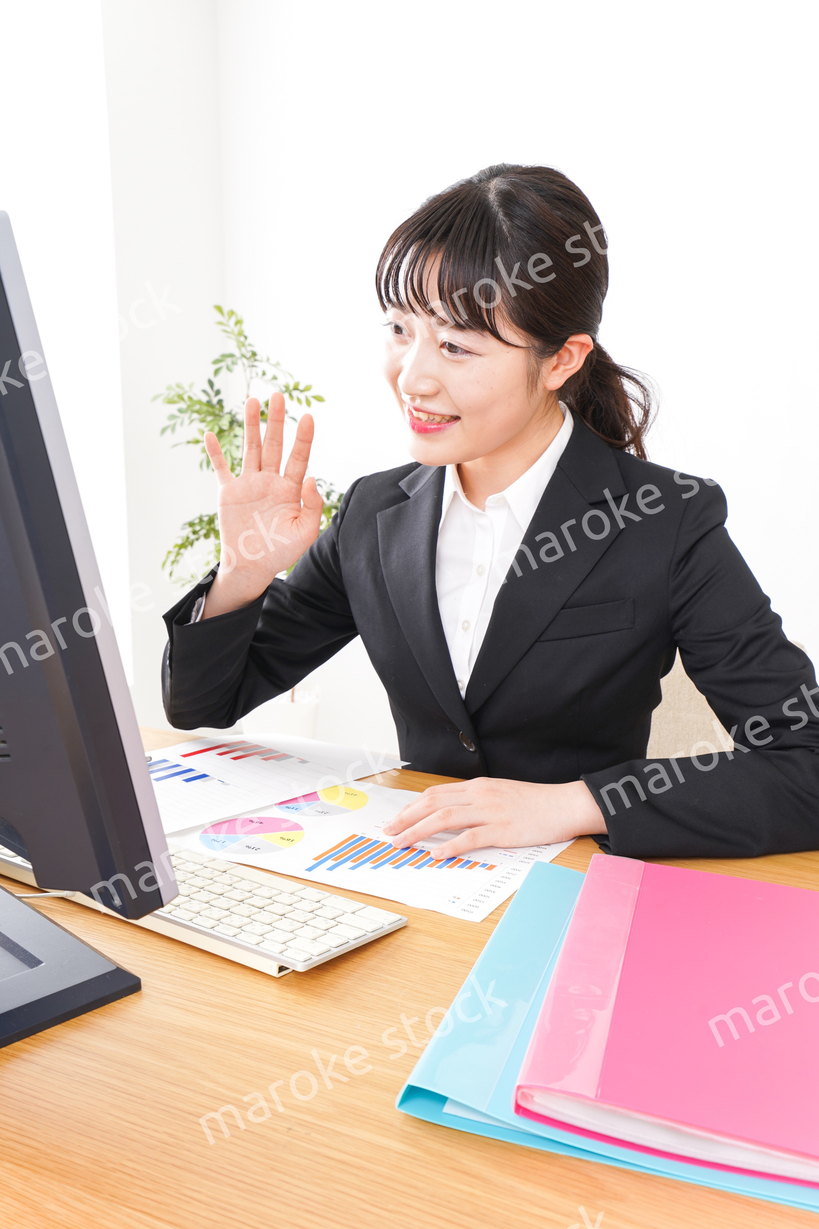 Young business woman at office