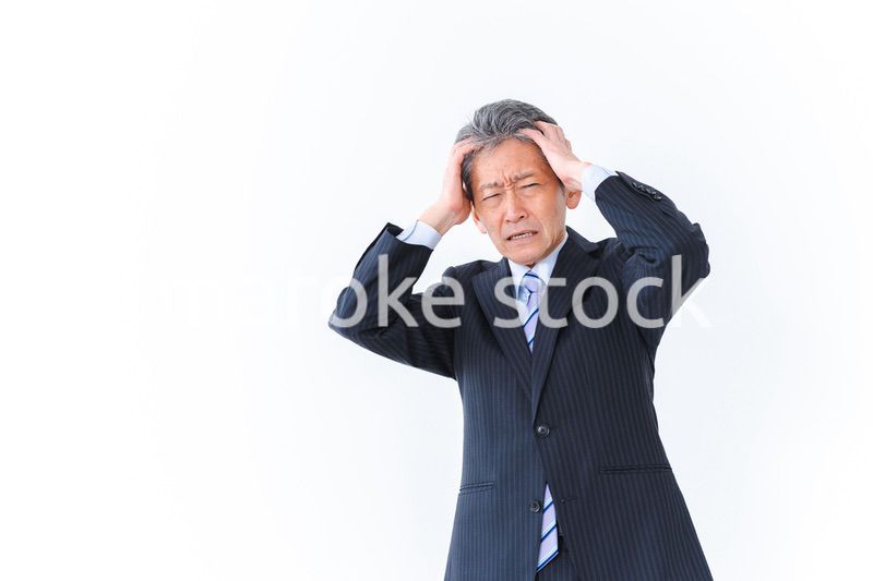 頭を抱える経営者