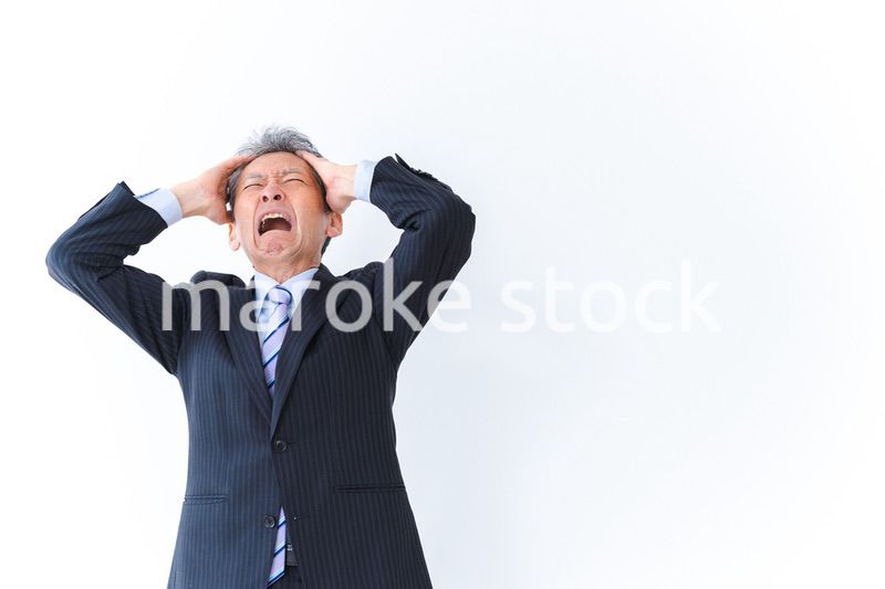 頭を抱える経営者