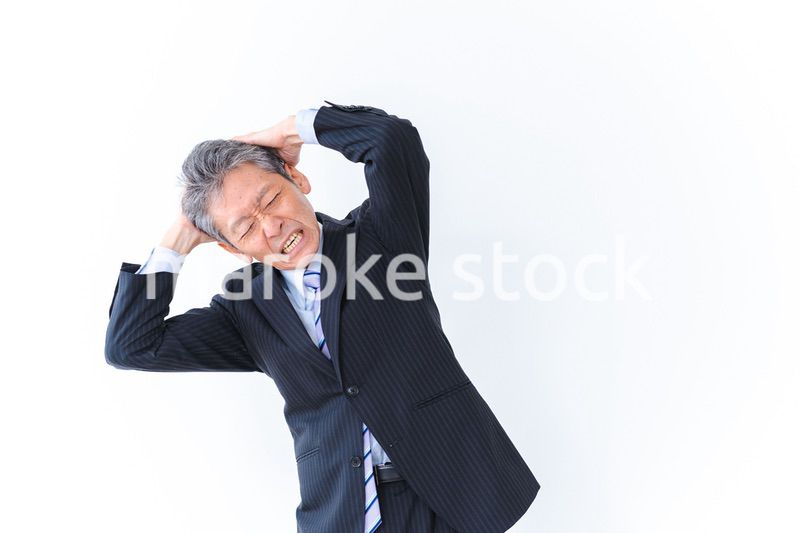 頭を抱える経営者