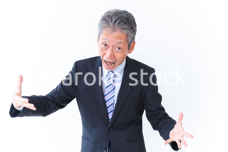 大爆笑をするビジネスマン