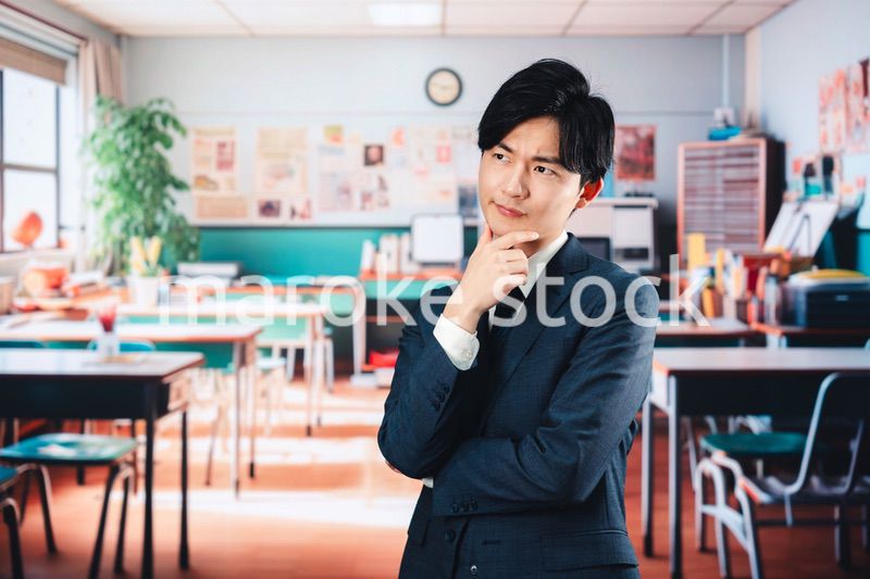 学校で悩む男性教師