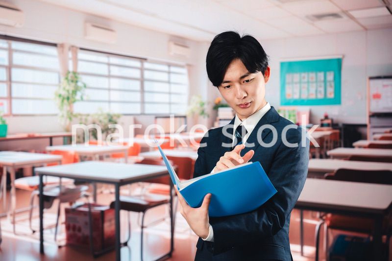 学校で悩む男性教師
