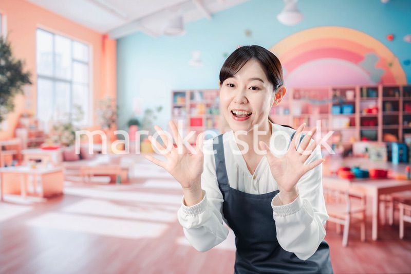 子供と仲良く接する保育士