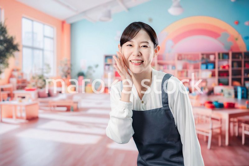 子供と仲良く接する保育士