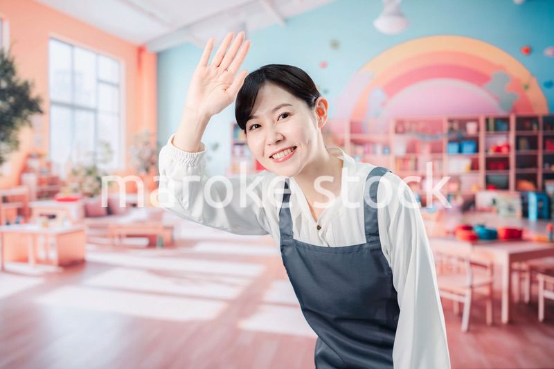 子供と仲良く接する保育士