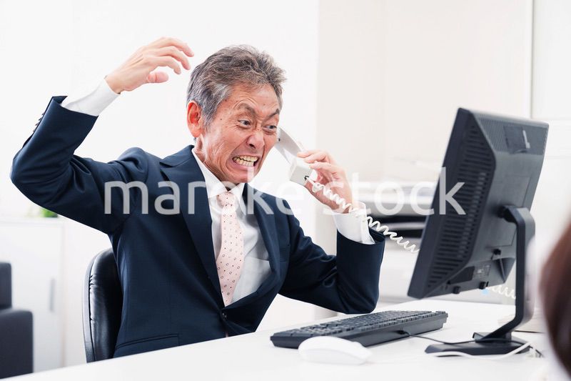電話で激怒する上司