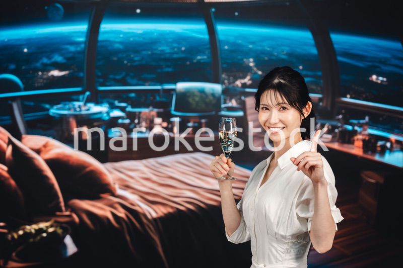 宇宙のホテルでスパークリングワインを楽しむ女性