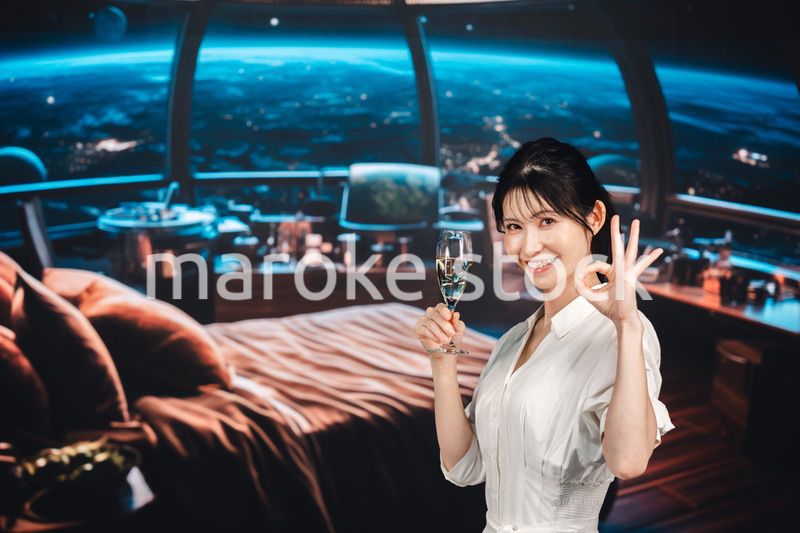 宇宙のホテルでスパークリングワインを楽しむ女性