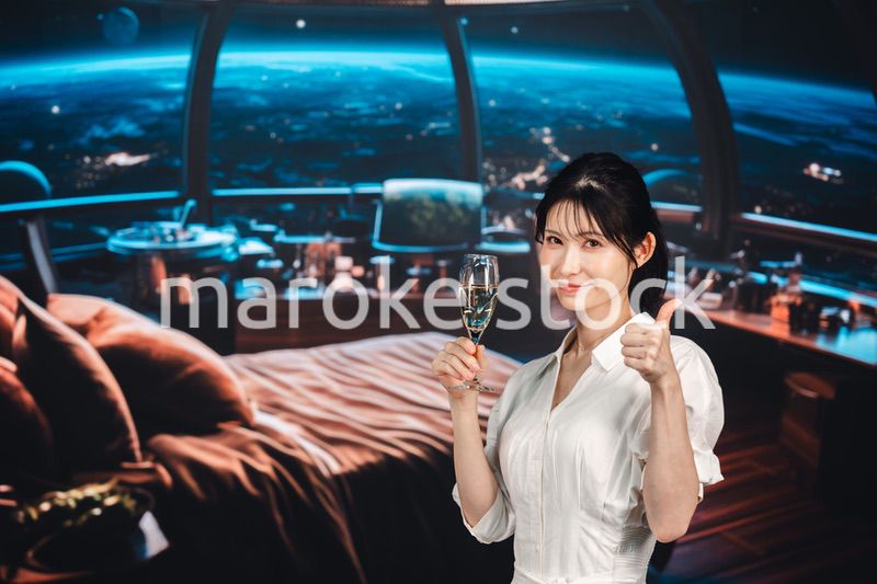 宇宙のホテルでスパークリングワインを楽しむ女性