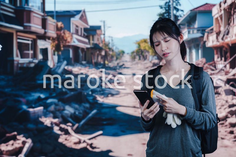 災害で被災した若い女性