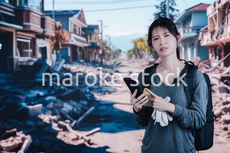 災害で被災した若い女性