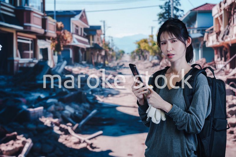 災害で被災した若い女性