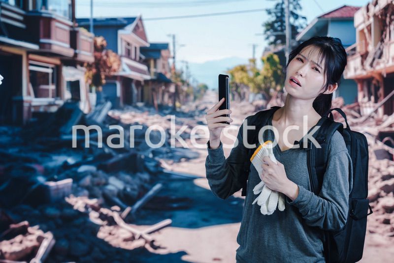 災害で被災した若い女性