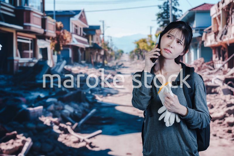 災害で被災した若い女性