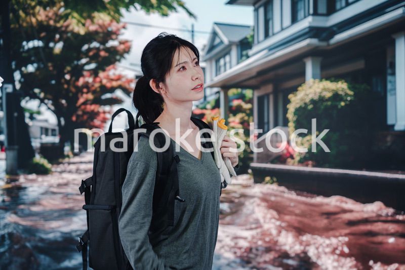 災害で被災した若い女性