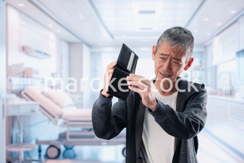 医療費に苦しむ高齢の男性