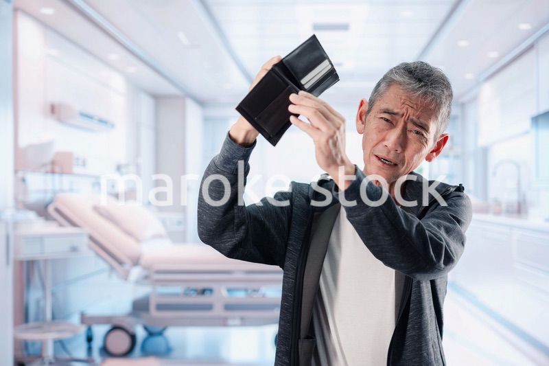 医療費に苦しむ高齢の男性