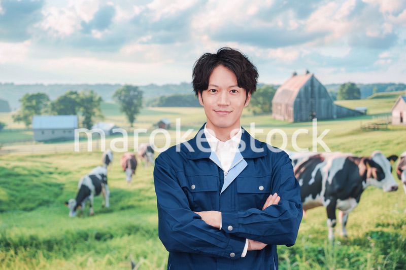 牧場で働く若い男性