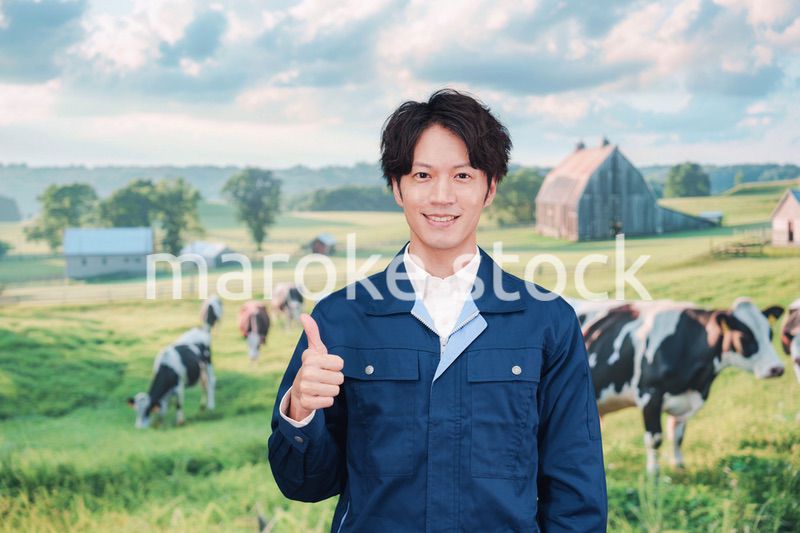 牧場で働く若い男性