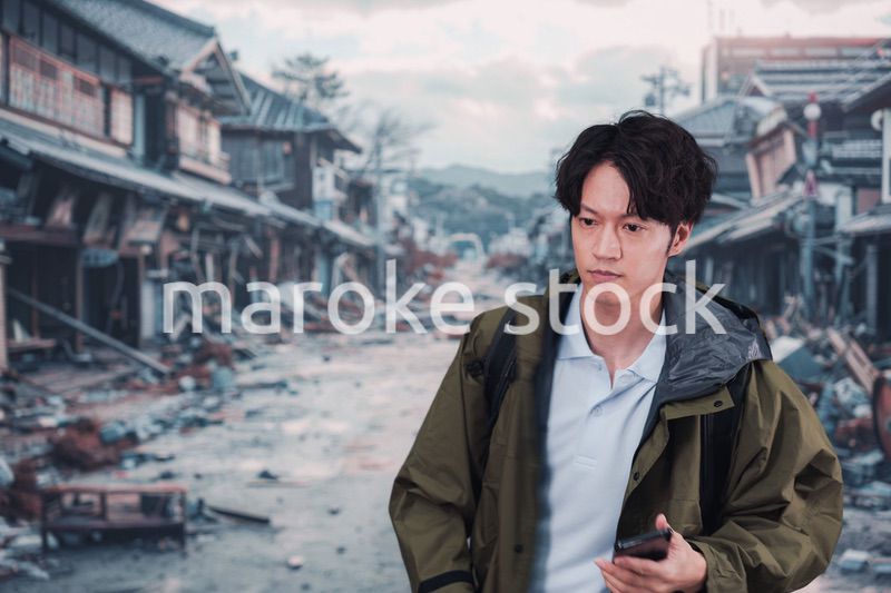 地震で被災した男性